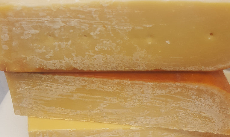 The Crystals on Your Cheese: What They Are and Why They're Good
